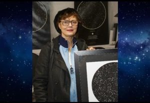 Susan Sarandon holding a her My Sky Moment map
